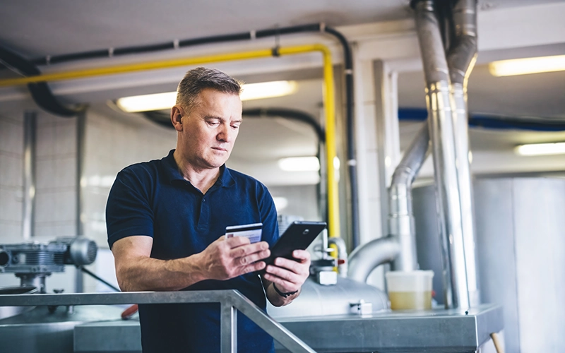 business owner with credit card